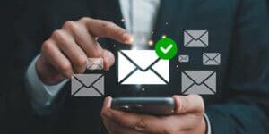 Why contractor emails go to spam illustrated by inbox delivery icons and a verified email message